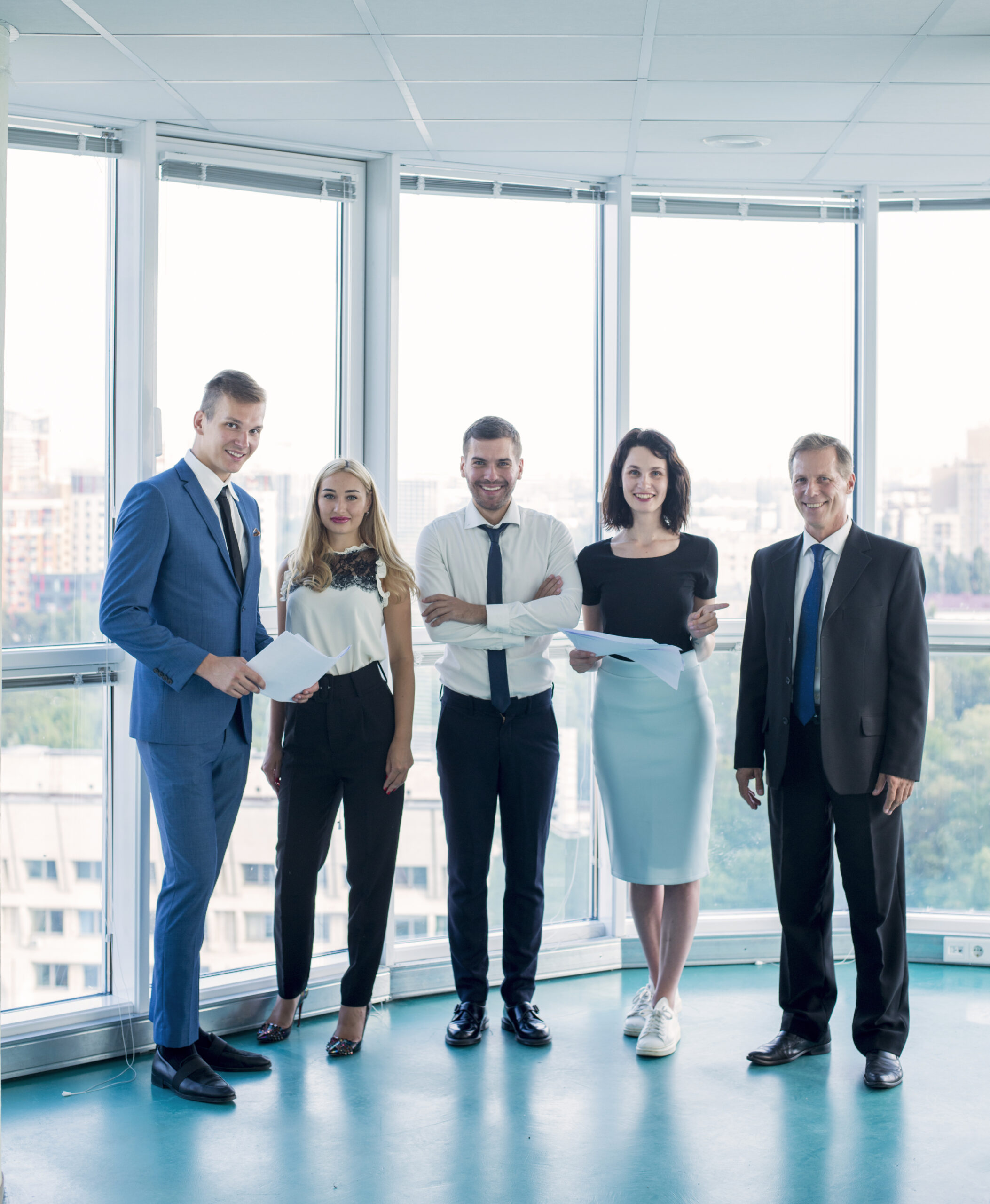 portrait-confident-businesspeople-standing-office